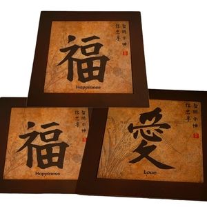 A set of 3 tiles that are ceramic.